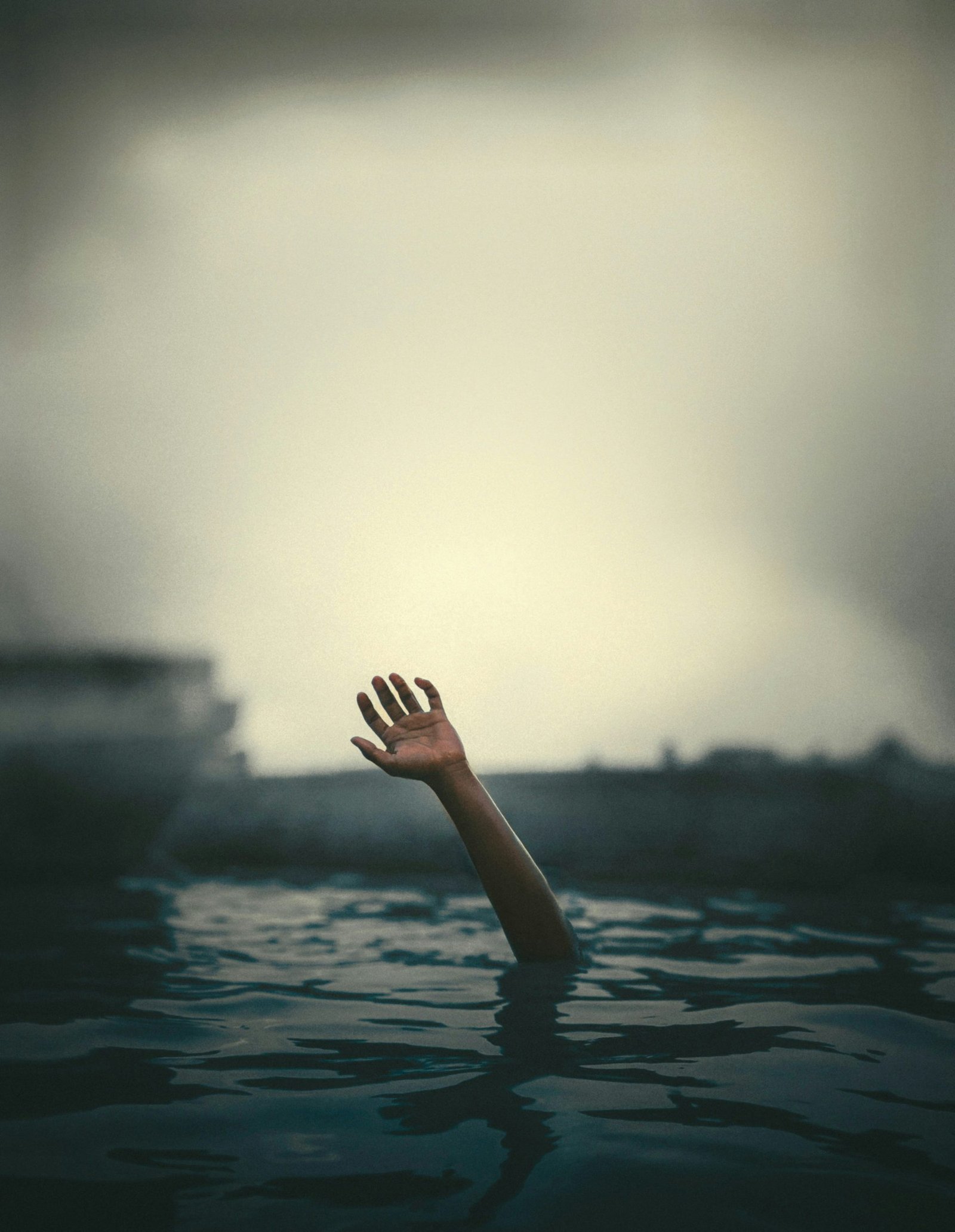 a hand in the water