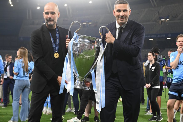 City manager Pep Guardiola and owner Sheikh Mansour with the Champions League trophy won last year.