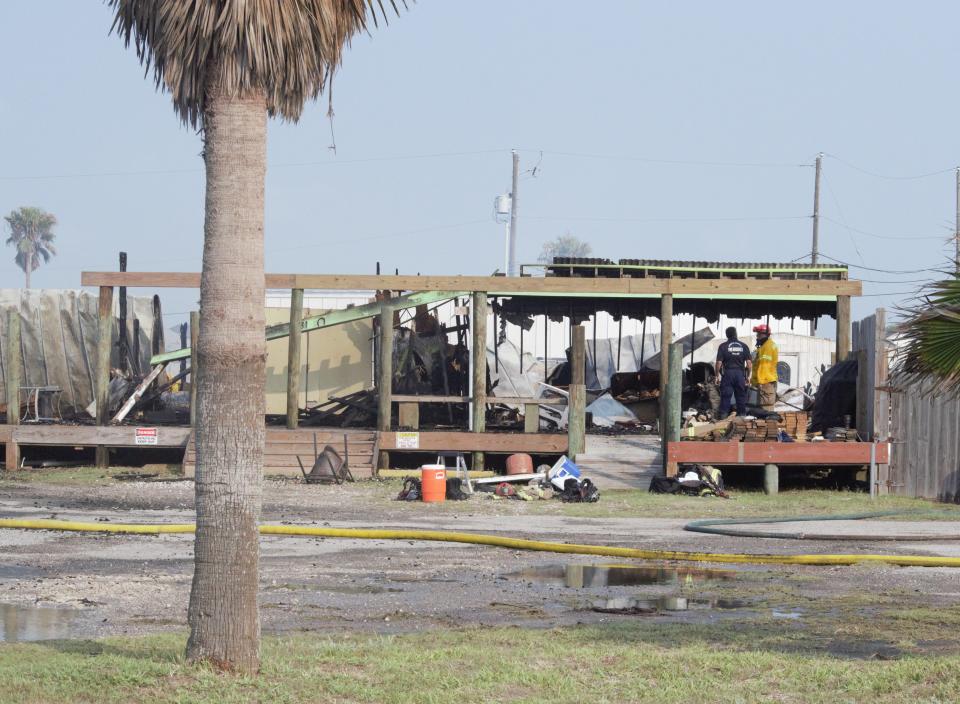 Firefighters worked diligently overnight to extinguish a fire that started at D&D Decks and Docks, a family-owned business on North Padre Island, late Wednesday.