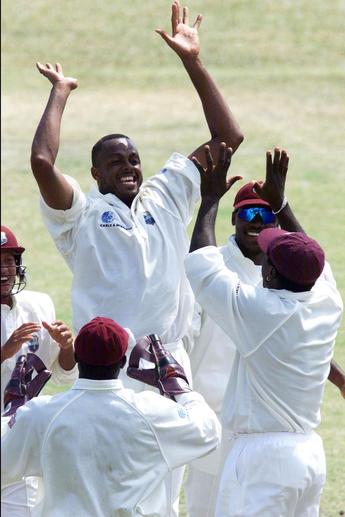 Courtney Walsh of the West Indies celebrates with fellow West Indies team-mates his 500th Test Wicket after trapping Jacques Kallis lbw for a duck during the 2nd Test played between South Africa and the West Indies at Queens Park Oval in Port of Spain Trinidad in 2021. 
