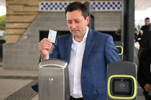 Opposition transport spokesman Matthew Guy uses a myki card during the 2022 state election campaign.
