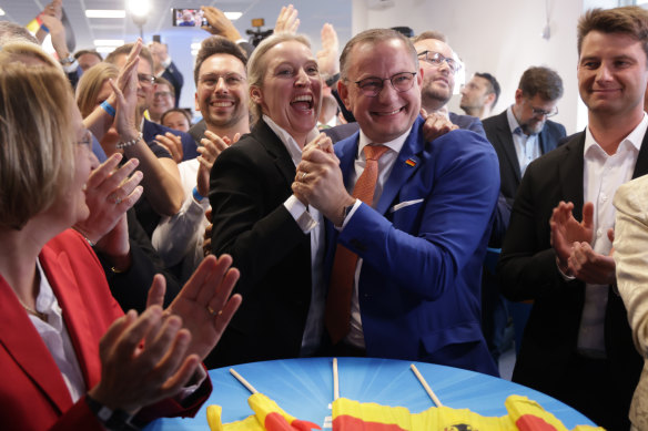 Tino Chrupalla and Alice Weidel, co-leaders of the far-right Alternative for Germany (AfD) political party, celebrate at the party’s gathering in Berlin following the release of initial results in European parliamentary elections.