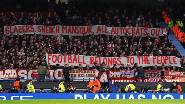 Fans of Bayern Munich protest during a Champions League clash earlier this year.