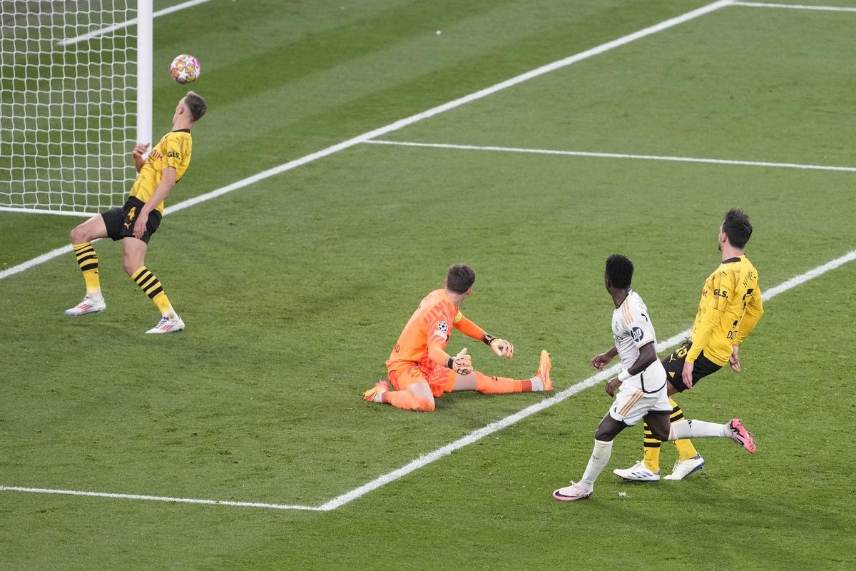 Vinicius Junior (in white) scores Real Madrid’s second goal in the Champions League final against Borussia Dortmund at Wembley.