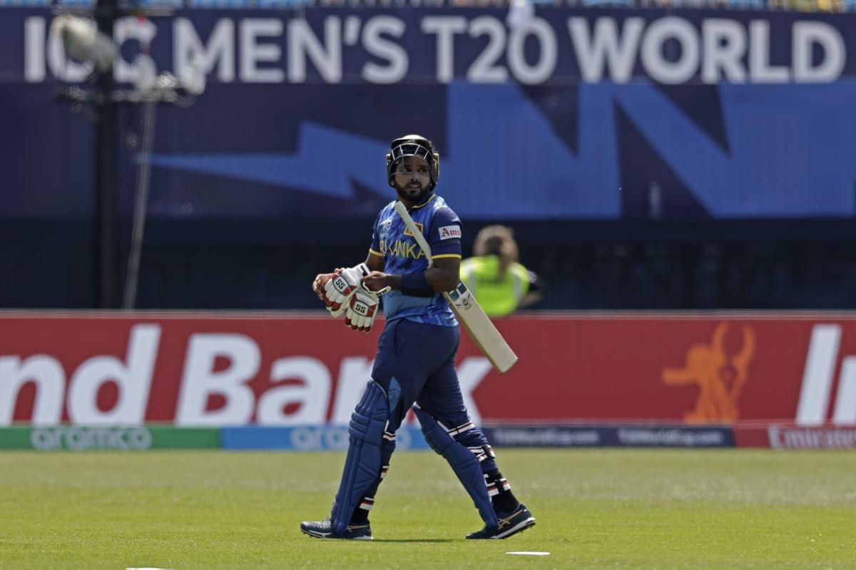 Sri Lanka’s captain Wanindu Hasaranga walks off the field after losing his wicket during the match against South Africa.