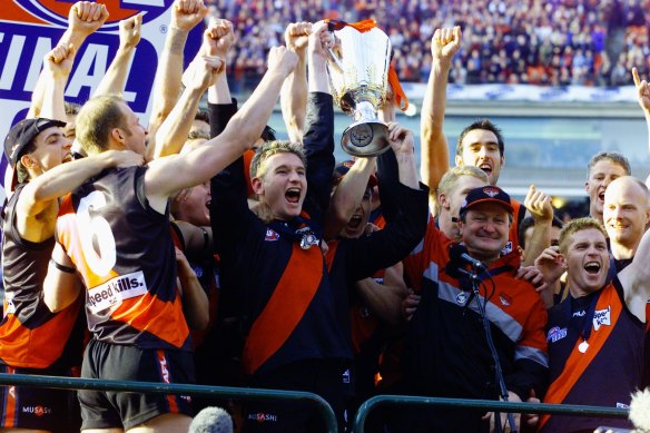 Captain James Hird and coach Kevin Sheedy lift the 2000 AFL premiership cup. There have been none since for Essendon.